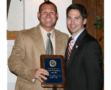 Coach Berry Accepts His Hall of Fame Award from Bluefield College President Dr. David Olive