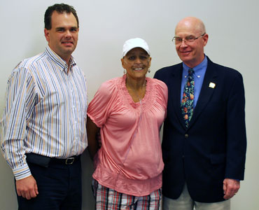 Belcher pictured with Union and AAC SID Jay Stancil (left) and AAC Commissioner John Sullivan at the AAC Spring Meetings.